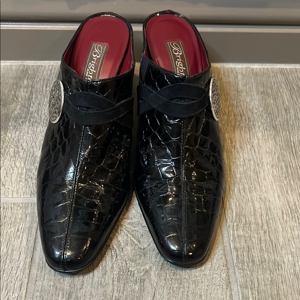 Brighton Black Romeo patent leather mules with silver medallion accent, size 7.5